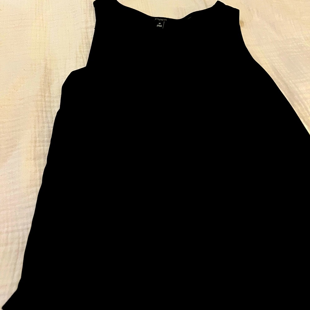 Women’s sleeveless tank top. Mixed media.